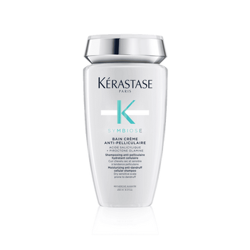 Botella de Bain Crème Symbiose de Kérastase, shampoo cremoso para cuero cabelludo sensible.